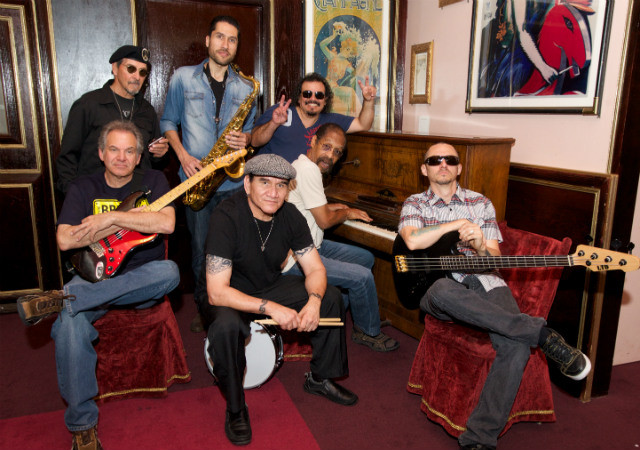 Members of the band from top left going right and down: Stanley Behrens plays the Harmonica- David Urquidi plays the saxophone and flute- Marcos Reyes is the percussionist, Stuart Ziff is the guitarist, Sal Rodriguez is the Drummer, Lonnie Jordan is the founding member, lead vocalist and plays the keyboard and Franciso “Pancho” Tomaselli – is the Bassist of the band “WAR.”(Courtesy of Rogers & Cowan )